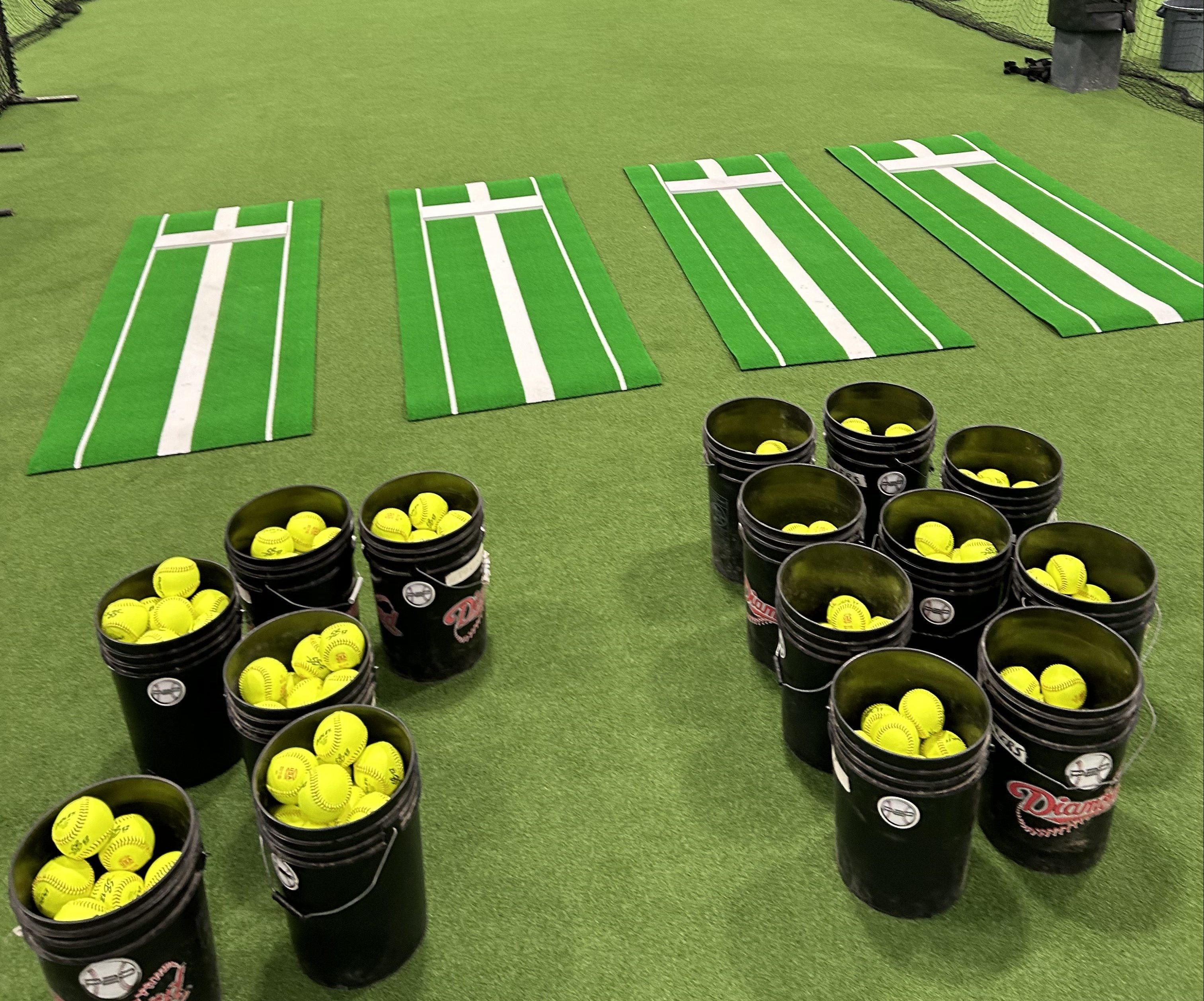 Fastpitch softballs and pitching mats for private lessons and softball clinics.